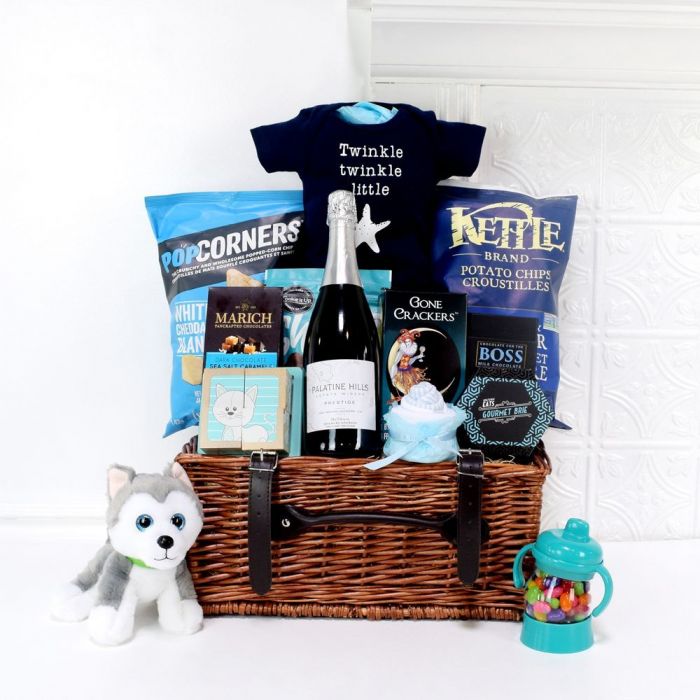 Wicker Basket Champagne Gift with Gourmet Snacks and Baby Essentials – how the gift is presented