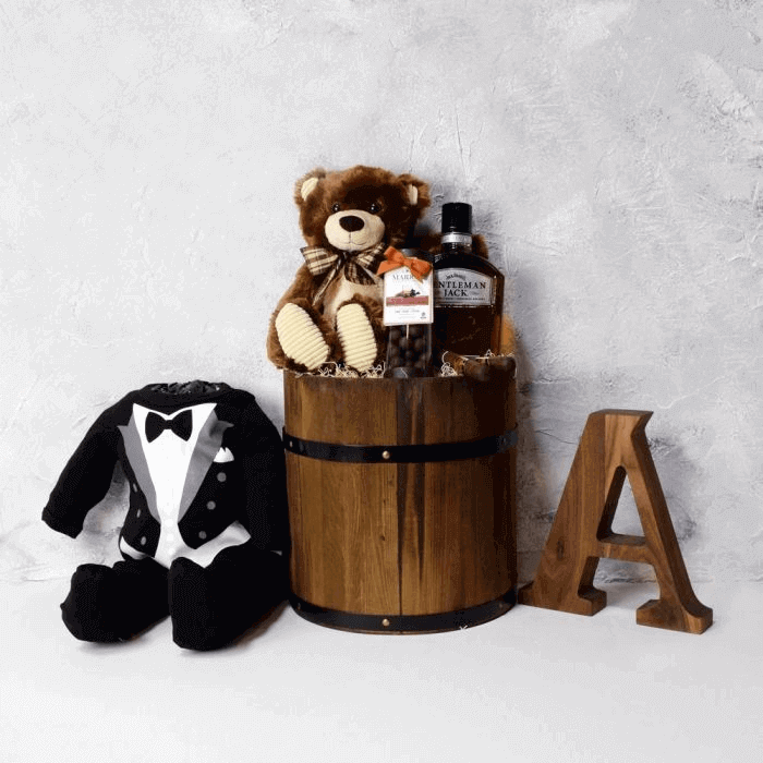 Whiskey Basket with Baby Tux Footsie, Marich Chocolates, and Medium Cigars – how the gift is presented